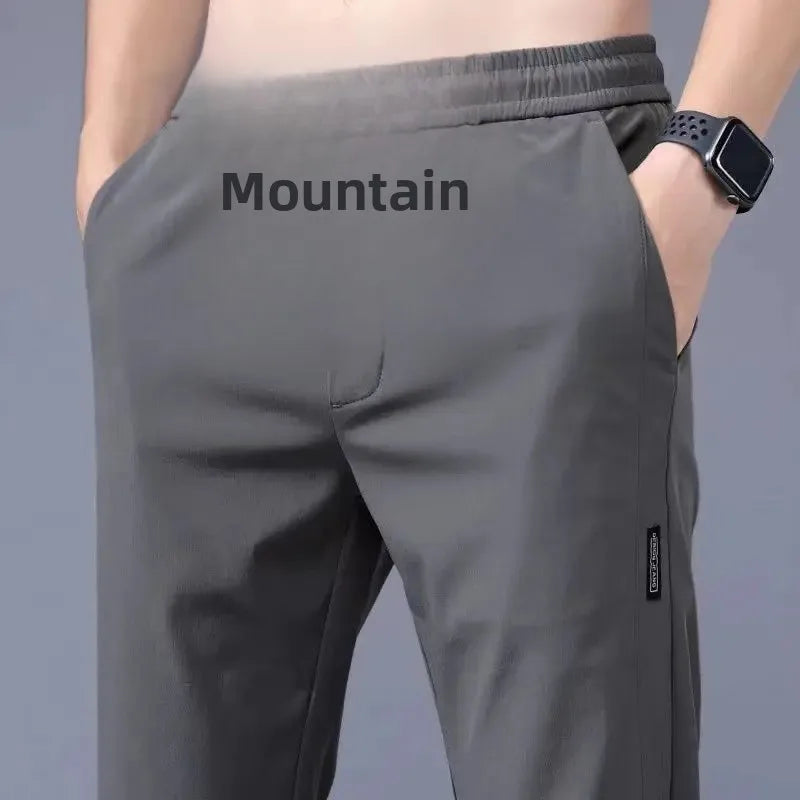 Verão fino casual calças esportivas de seda gelo secagem rápida solta tamanho grande perna reta elástica resistente ao desgaste calças compridas para homem